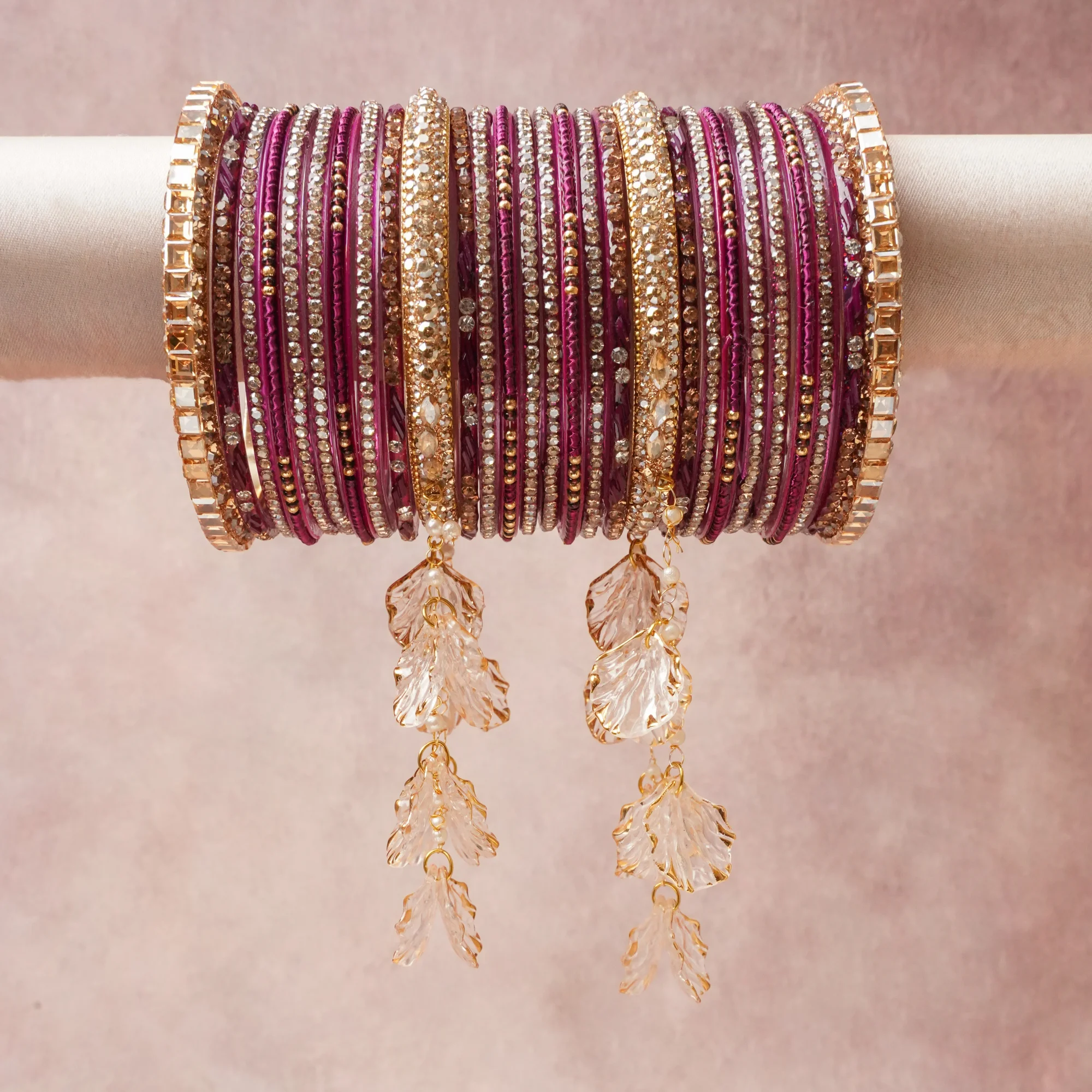 A majestic Deep Plum set, complemented by Gold, Clear featuring Glass, Gold-toned Metal, Rhinestones, Translucent Acrylic, Imitation Pearl.
Rich, ceremonial, and designed to be passed through generations.